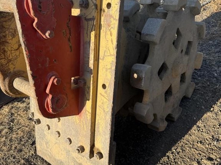 cat-backhoe-compaction-wheel-image-3