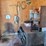 shop-contents-lot-with-metal-workbench,-hand-tools,-automotive-parts,-hardware,-and-signage-image-1