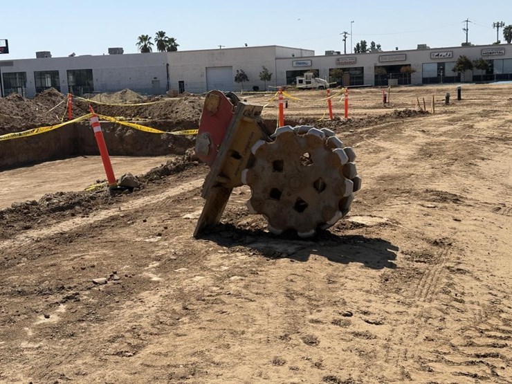 cat-excavator-compaction-wheel-image-1