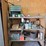 shop-shelf-contents-including-curtis-small-parts-cabinet,-calculator,-hardware,-and-miscellaneous-tools-image-1
