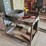 rolling-metal-utility-cart-with-assorted-hand-tools-and-metal-basin-image-1