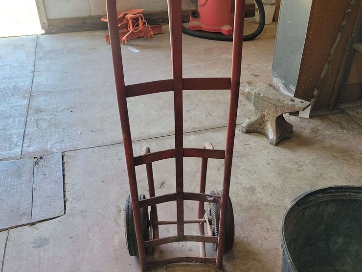 red-metal-hand-truck-utility-cart-with-pneumatic-tires-image-1