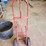red-metal-hand-truck-utility-cart-with-pneumatic-tires-image-2