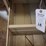 metal-office-desk-with-rolling-chair-and-drawer-contents-image-7