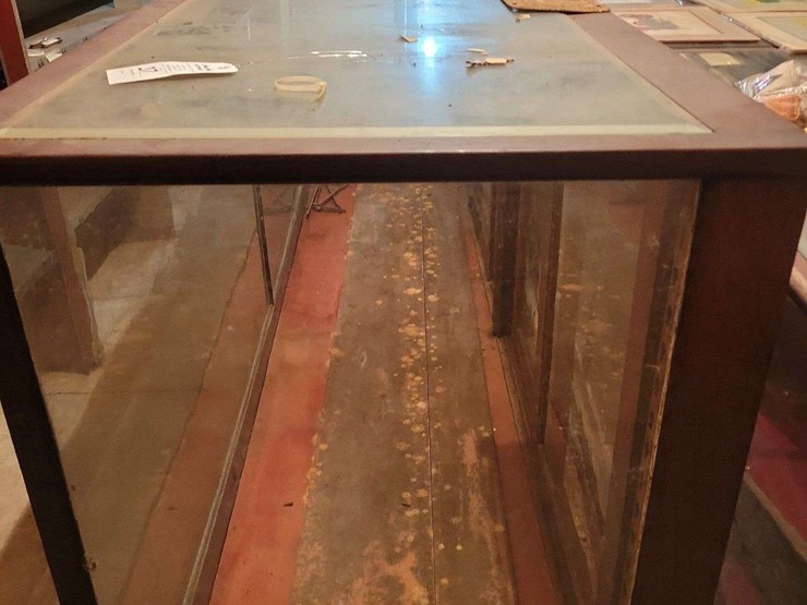 large-wooden-store-display-counter-with-glass-panels-image-1