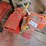 lot-of-red-fuel-cans-and-storage-box-image-1
