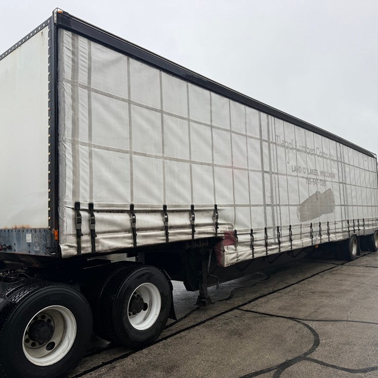 #1652 • 1999 Nu Van Technology Inc. 48' Curtain Side Semi Trailer