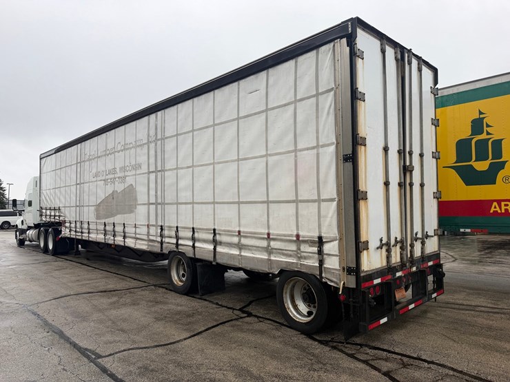#1652-•-1999-nu-van-technology-inc.-48'-curtain-side-semi-trailer-image-3
