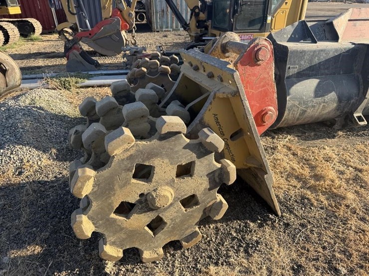 cat-backhoe-compaction-wheel-image-2