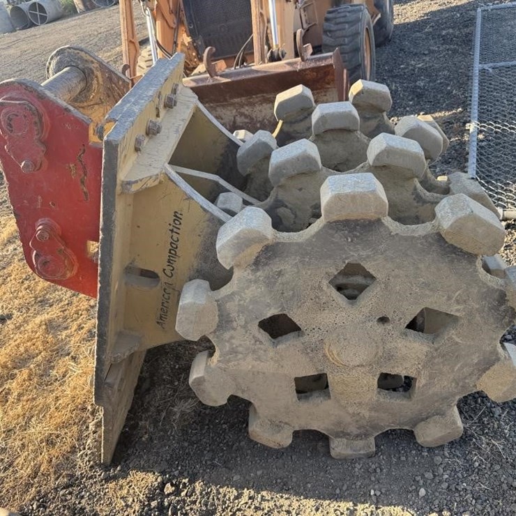 CAT Backhoe Compaction Wheel