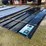 #8384-•-appears-unused-black-metal-roof-panels-image-1