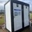 #8357-•-appears-unused-mobile-double-toilet-white-w/-black-frame-image-1
