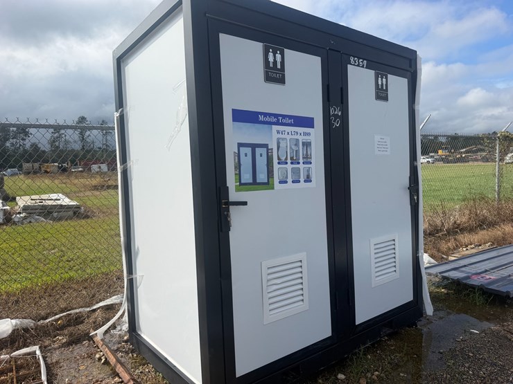 #8357-•-appears-unused-mobile-double-toilet-white-w/-black-frame-image-1