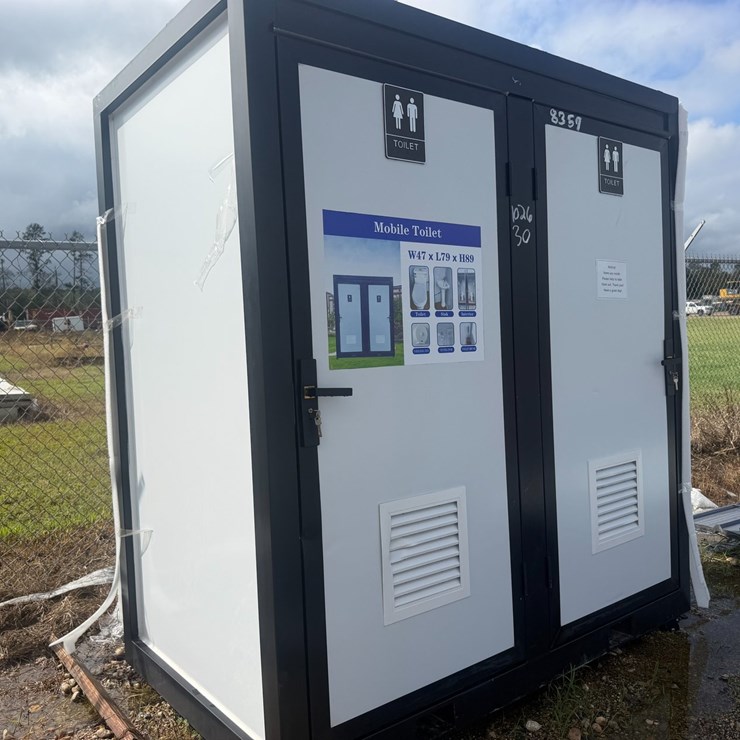 #8357 • Appears Unused Mobile Double Toilet White w/ Black Frame