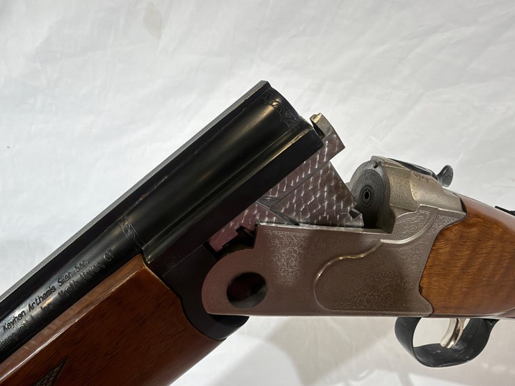 #32-•-mossberg-silver-reserve-ii-over/under-shotgun-image-32