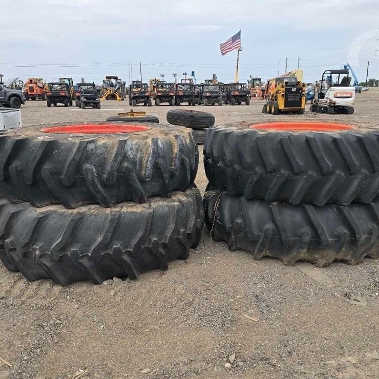 QTY. (4) TRACTOR TIRES WITH RIMS. 20.8-34 RUBBER