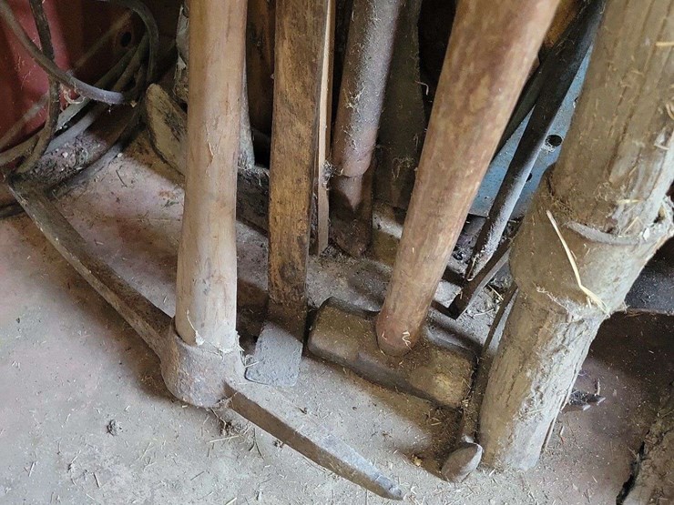 assorted-long-handled-tools-and-air-hoses-image-2