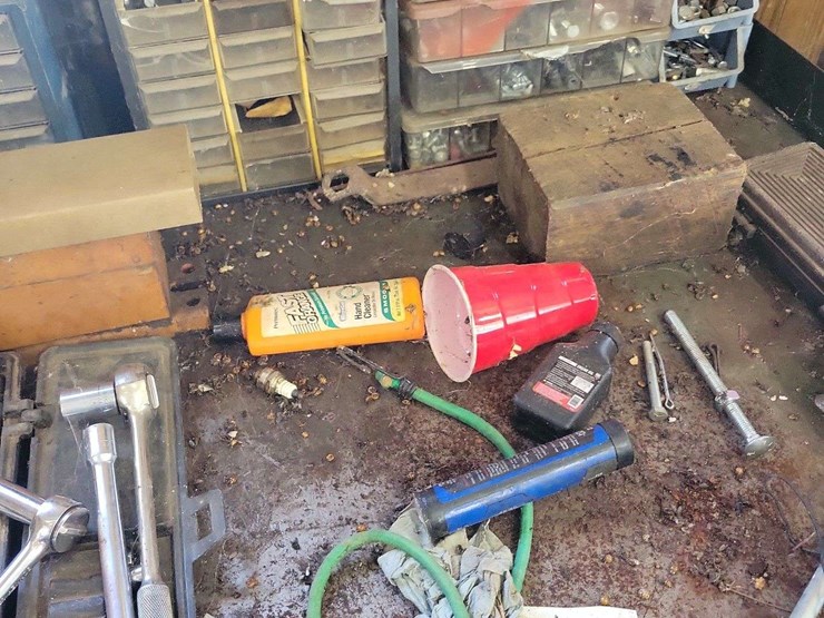 metal-workbenches-with-integrated-storage-and-assorted-automotive-tools-image-4