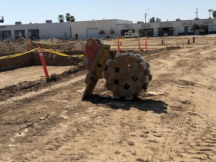 cat-excavator-compaction-wheel-image-1