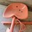 orange-painted-cast-metal-tractor-seat-with-spring-suspension-mount-image-3