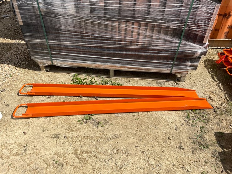 #2083-•-wolverine-skid-steer-pallet-fork-extensions-attachment-image-1