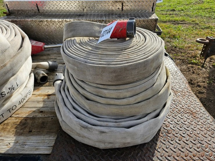 #2144-•-stack-of-1-3/4"-water-hoses-image-1