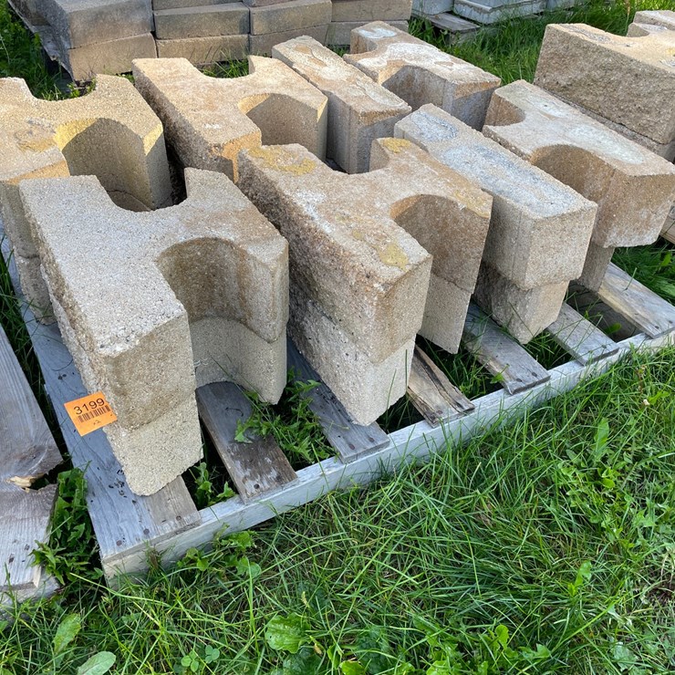 #3199 • (2) Pallets of Interlocking Concrete Retaining Wall Blocks