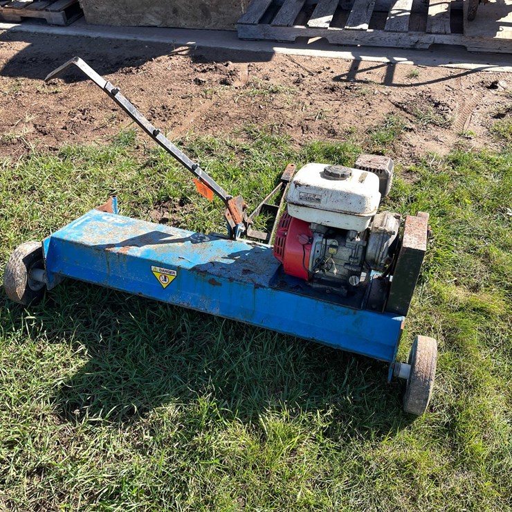#1824 • Blue Bird 36" Pull Behind Aerator