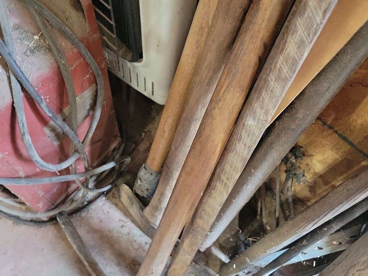 assorted-long-handled-tools-and-air-hoses-image-4