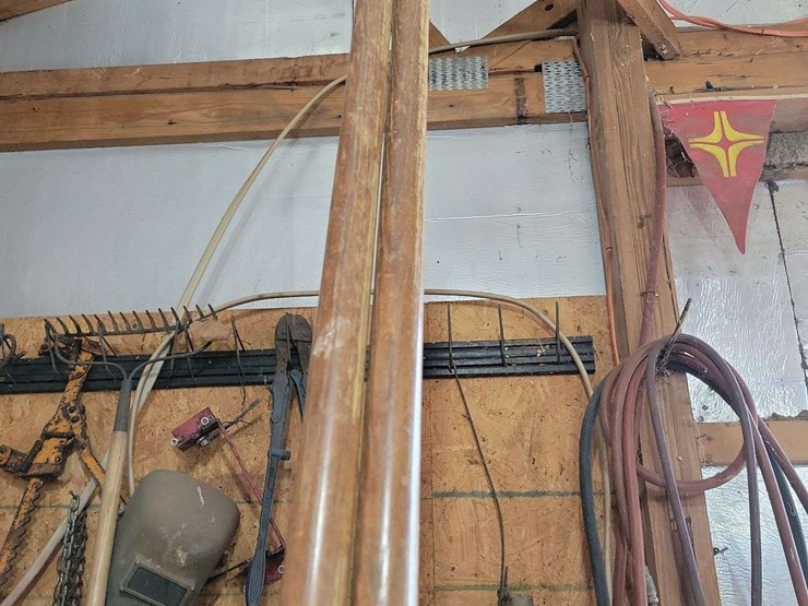 manual-post-hole-digger-with-wooden-handles-and-steel-blades-image-3