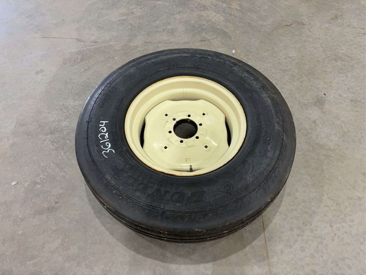 dunlop-9.00-r-20-implement-tire-on-6-lugg-rim-image-1