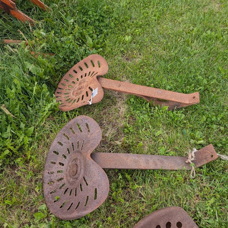 #4057 • Vintage Metal Tractor Seats