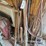 assorted-long-handled-tools-and-air-hoses-image-1