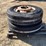 #3022-•-(2)-295/75r22.5-semi-steer-tires-and-rims-image-1