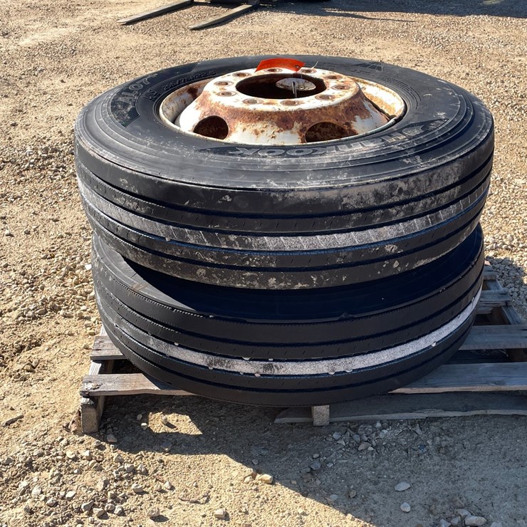#3022 • (2) 295/75R22.5 Semi Steer Tires and Rims
