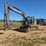 2011-deere-135d-image-1