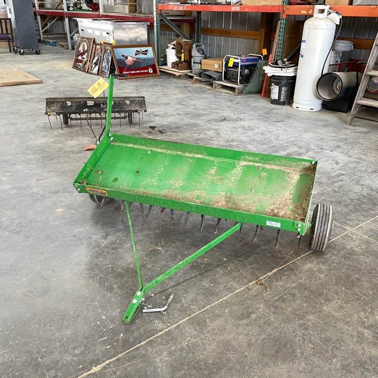#3002 • John Deere Yard Dethatcher