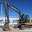 2015-deere-135g-image-1