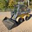 2014-deere-320e-image-1