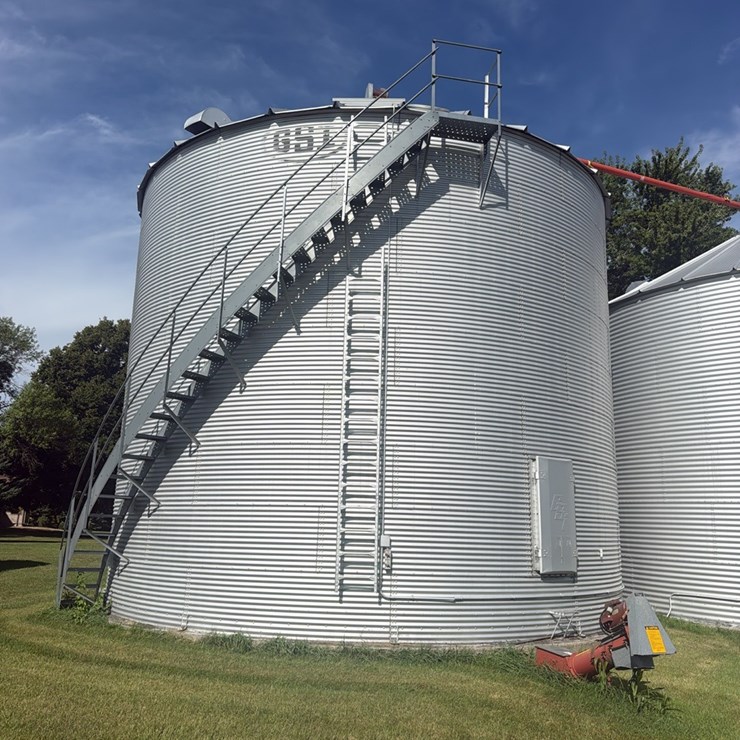 GSI Grain Bin, 30’ Approx 14,000 Bu, Side Stairs, Full Floor, unloading auger, GSI Fan, Top South Cross Auger Goes with This Bin,  Seller to Disconnect Power to Bin,  Buyer Responsible for  Removal, Sold Subject to Seller Confirmation