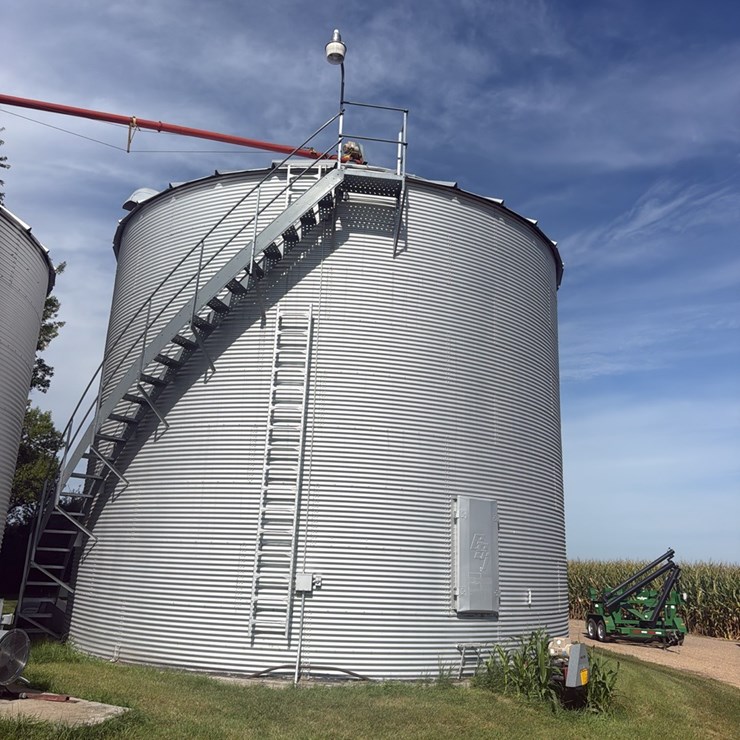GSI Grain Bin, 30’ Approx 14,000 Bu, Side Stairs, Full Floor, Unloading Auger, Top North Cross Auger Goes with This Bin,  Seller to Disconnect Power to Bin,  Buyer Responsible for  Removal, Sold Subject to Seller Confirmation
