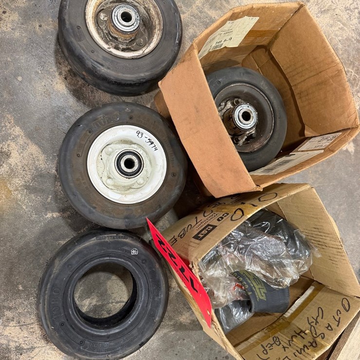 #1722 • Set Of Zero Turn Tire And Wheel Assemblies