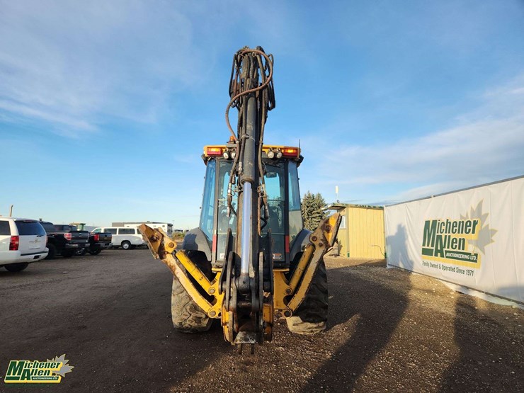 2014-deere-310sk-image-35