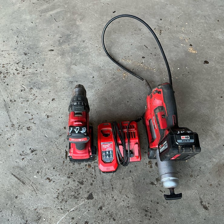 #108 • Milwaukee M18 Cordless Tool Lot: 2706-20 Hammer Drill, 2646-20 Grease Gun, 48-59-1808 Rapid Charger & Batteries