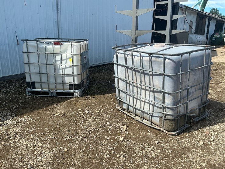 #181-•-(2)-250-gallon-ibc-tote-tanks-in-steel-cages-image-1