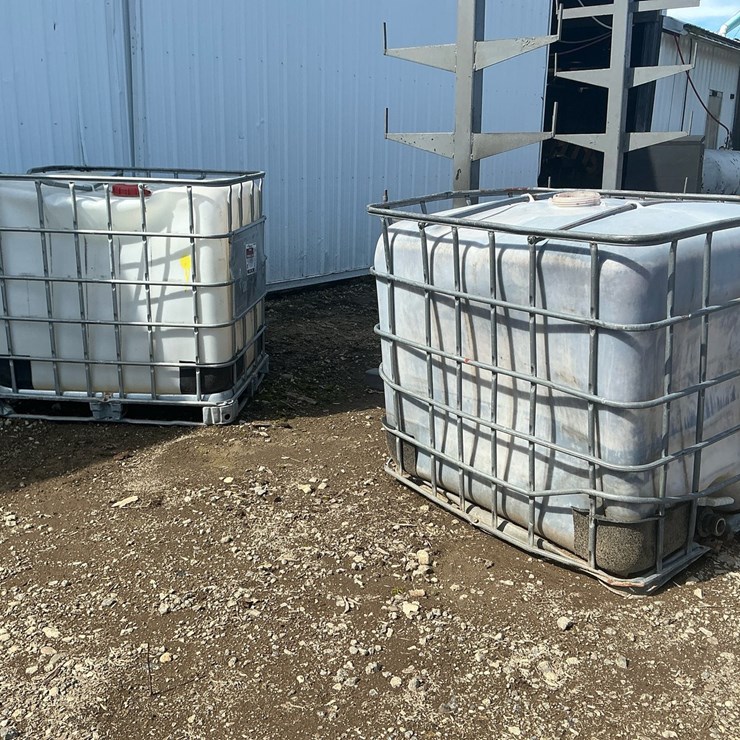 #181 • (2) 250-Gallon IBC Tote Tanks in Steel Cages