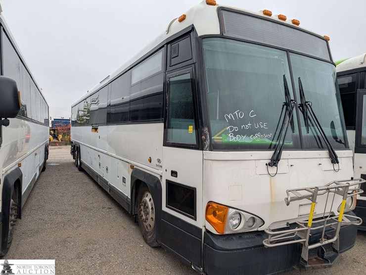 non-operable-2011-motor-coach-industries-d4500-t/a-55-passenger-wheelchair-accessible-bus-image-3