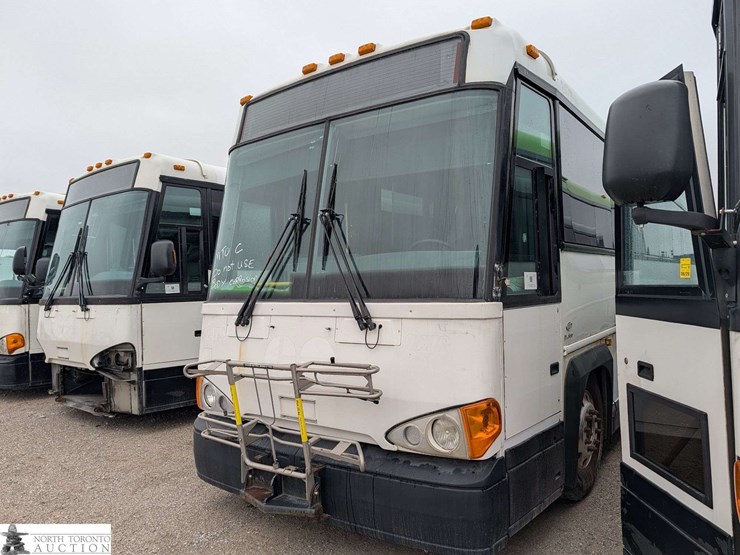 non-operable-2011-motor-coach-industries-d4500-t/a-55-passenger-wheelchair-accessible-bus-image-1