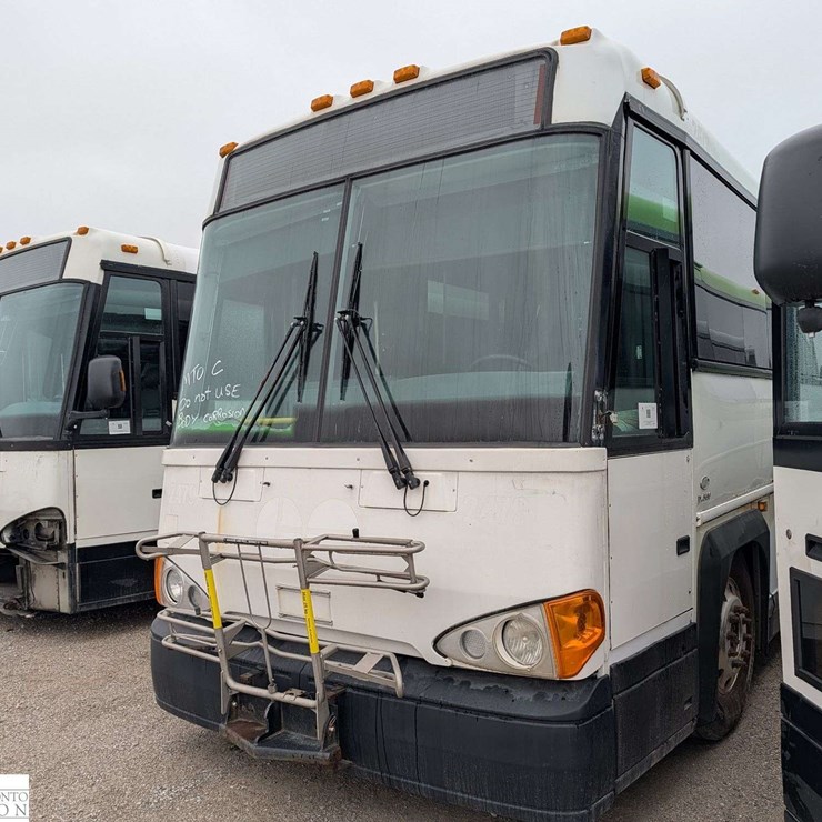 Non-Operable 2011 Motor Coach Industries D4500 T/A 55 Passenger Wheelchair Accessible Bus