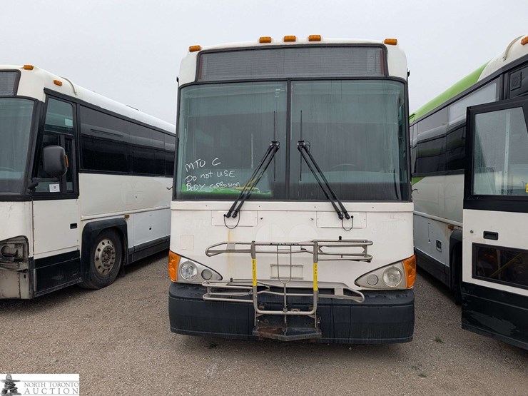non-operable-2011-motor-coach-industries-d4500-t/a-55-passenger-wheelchair-accessible-bus-image-2